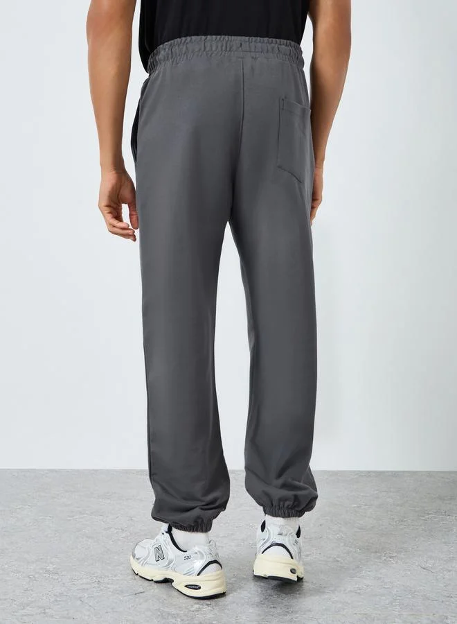 Styli  Men Charcoal Grey Oversized Joggers for Men | Best Price UAE